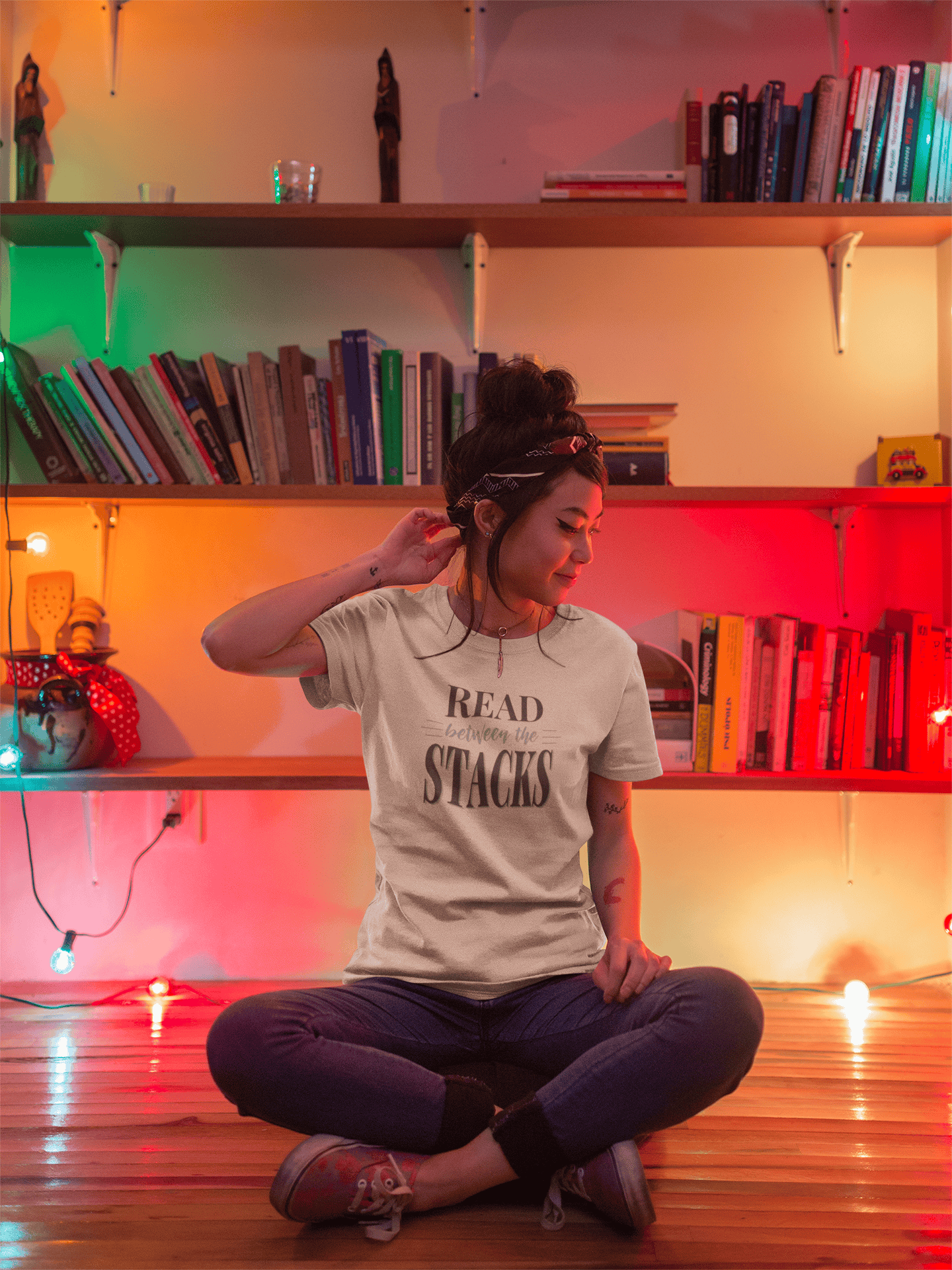 Read Between The Stacks — Vintage Book Lover Tee